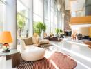 Luxurious modern lobby with large windows, seating areas, and natural light