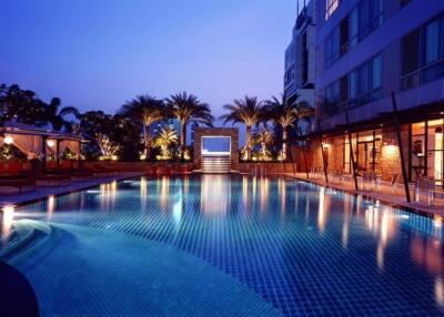 Pool area with evening lighting