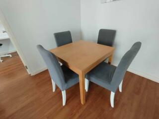 Dining area with table and four chairs