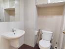 Modern bathroom with wall-hung sink and toilet