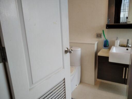 Bathroom with sink and toilet