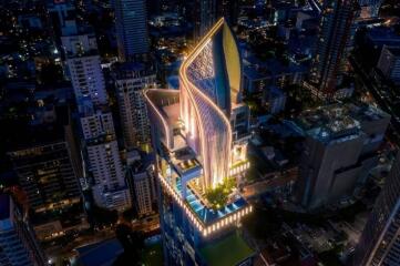 Aerial view of modern high-rise building in a city at night