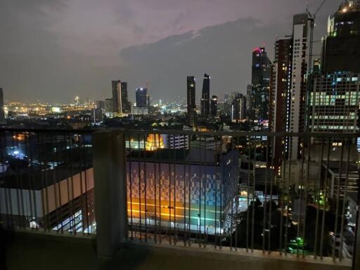 Night view of cityscape from high-rise balcony