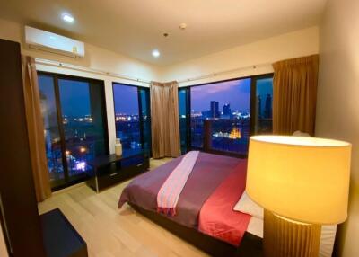 Bedroom with night city view