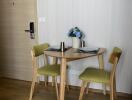 Small dining table with two chairs