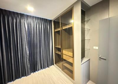 Modern bedroom with closet and shelves