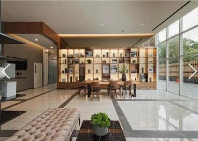 Modern lobby area with decorative shelving and seating