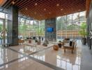 Lobby with seating area and glass walls