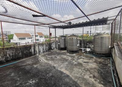 rooftop area with water tanks