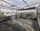 rooftop area with water tanks