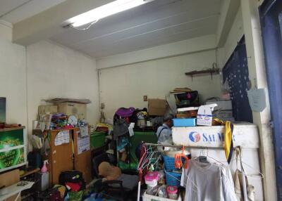 Cluttered room with various items