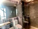 Modern bathroom with glass shower enclosure