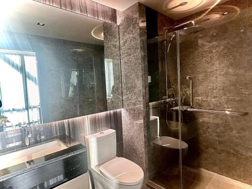 Modern bathroom with glass shower enclosure