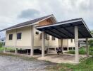 Elevated house with covered parking area