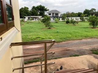 View of the front yard from the house entrance