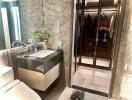 Modern bathroom with walk-in closet