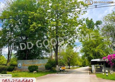 Entrance with trees and greenery