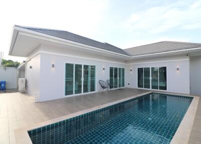 Modern house exterior with swimming pool