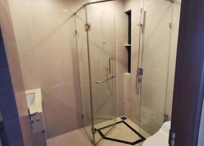 Modern bathroom with glass shower enclosure