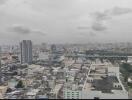 Aerial view of cityscape showing multiple buildings and structures