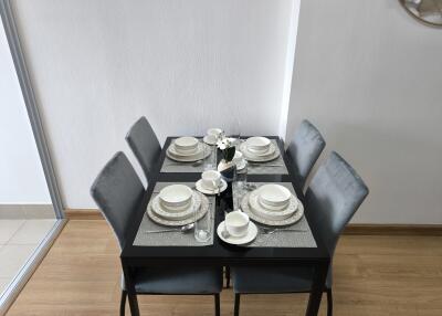 Small dining area with table set for four