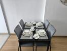 Small dining area with table set for four