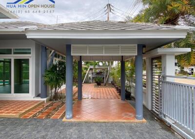 Front view of a house with a covered entrance