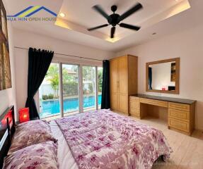 Bedroom with pool view