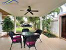 Covered outdoor patio with table and chairs