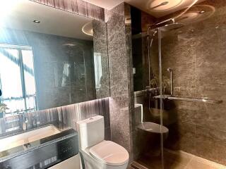 Modern bathroom with glass shower and vanity