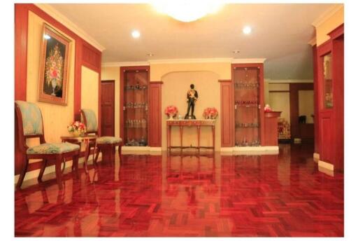 Polished wooden living area with decor and seating