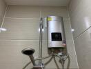 Modern bathroom shower setup with water heater