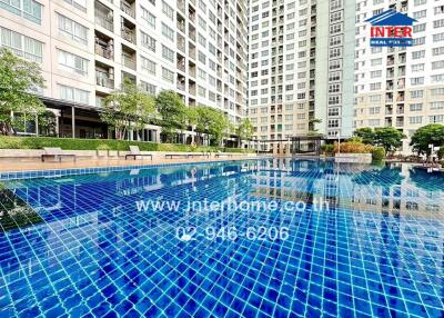 Exterior view of apartment buildings with a swimming pool