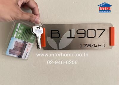 Key holder and building unit number