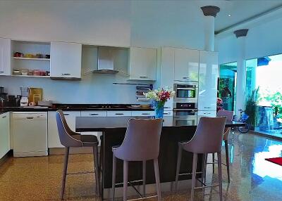 Modern kitchen with island and bar stools