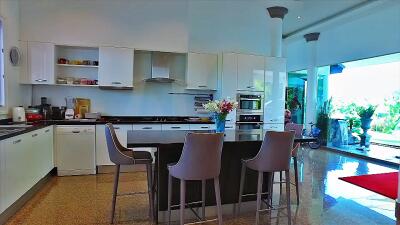 Modern kitchen with island and bar stools