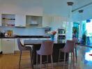 Modern kitchen with island and bar stools