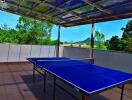 Terrace with table tennis setup and scenic view