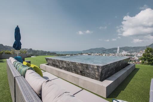 Rooftop area with infinity pool and scenic view