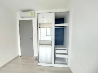 Bedroom with wardrobe and air conditioning