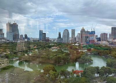 View of cityscape with park and lake