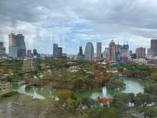 View of cityscape with park and lake