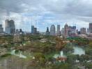 View of cityscape with park and lake