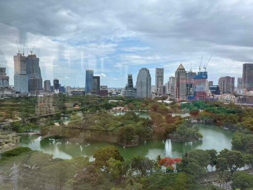 View of cityscape with park and lake