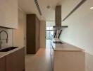 Modern kitchen with central island and integrated appliances