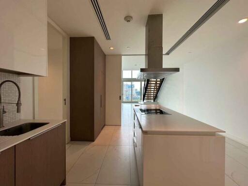 Modern kitchen with central island and integrated appliances