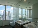 Modern bathroom with large windows and city view