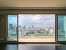 Spacious living room with large windows and city view