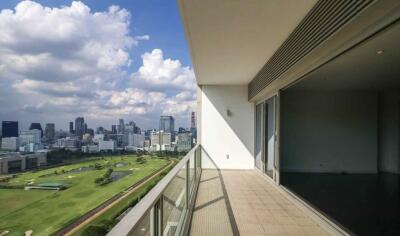 Spacious glass balcony with cityscape view