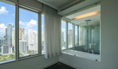 Modern bathroom with a city view